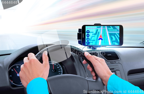 Image of navigator on dashboard of car