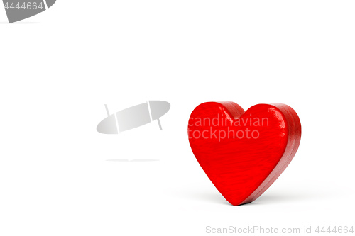Image of A red wooden hearts on a white background