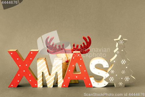 Image of Christmas decoration with xmas text and hidden reindeer