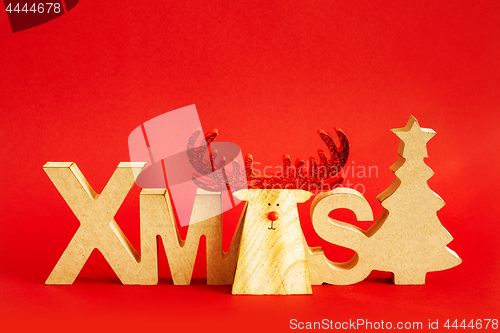 Image of Christmas decoration with xmas text and a reindeer