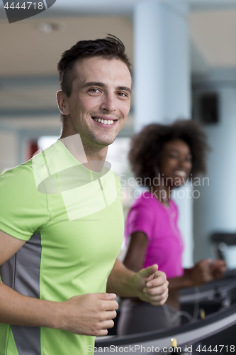 Image of people exercisinng a cardio on treadmill