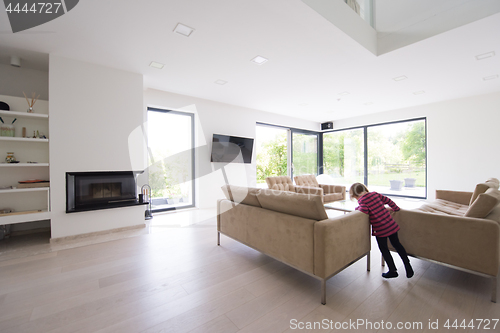 Image of little girl in a luxurious living room