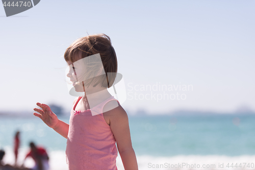 Image of little cute girl at beach