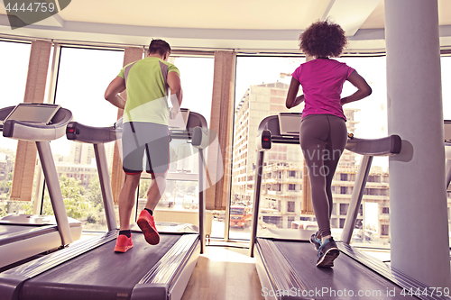 Image of people exercisinng a cardio on treadmill