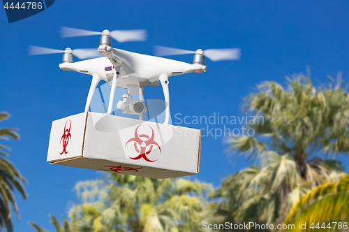 Image of Unmanned Aircraft System (UAV) Quadcopter Drone Carrying Package