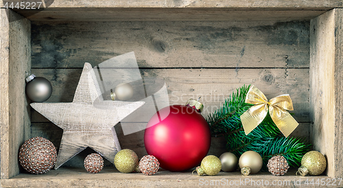 Image of Typical Christmas symbols decoration on a wooden background