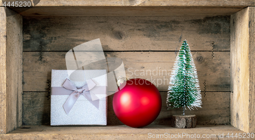 Image of Christmas symbols decoration gift box red glass ball and fir tre