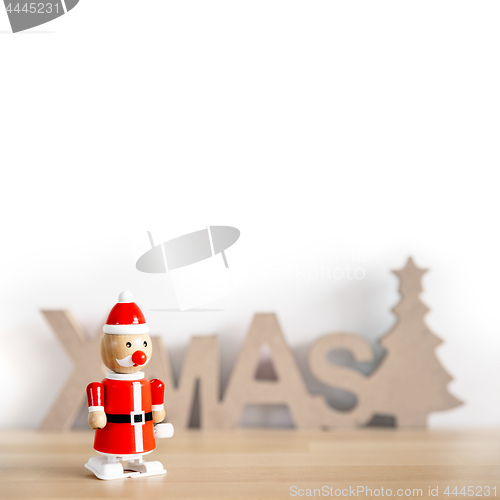 Image of a sweet Santa Claus toy with space for your content