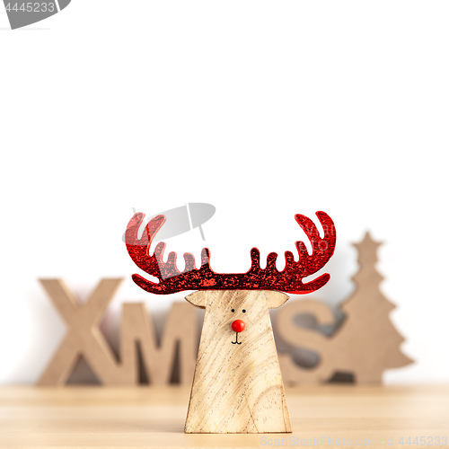 Image of Christmas decoration with xmas text and a reindeer