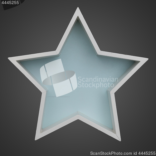 Image of white wooden Christmas star shape frame