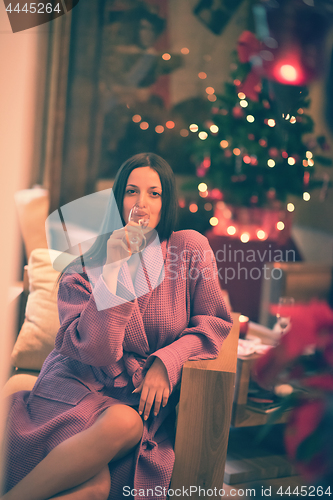 Image of woman drinking champagne at spa