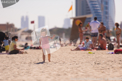 Image of little cute girl at beach