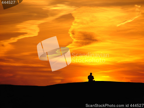 Image of Man on sunset background