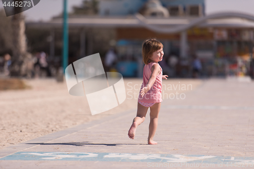 Image of little cute girl at beach