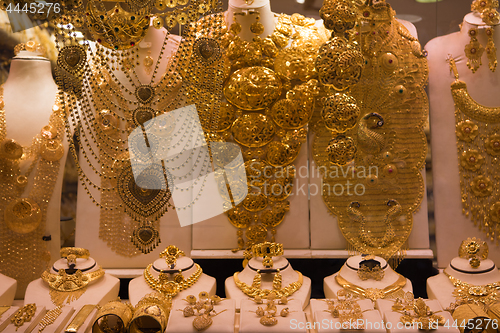 Image of gold jewelry in the shop window