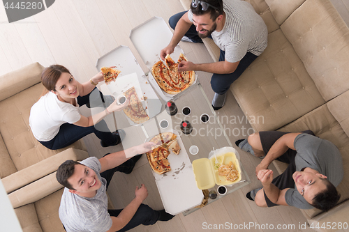 Image of Pizza time a group of people