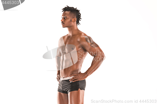 Image of Fit young man with beautiful torso isolated on white background
