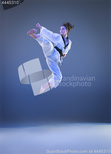 Image of The karate girl with black belt