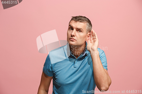 Image of The happy business man standing and young man listening