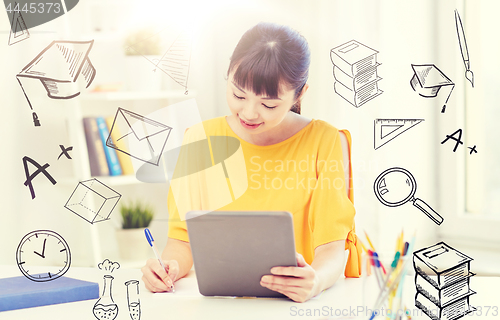 Image of asian woman student with tablet pc at home