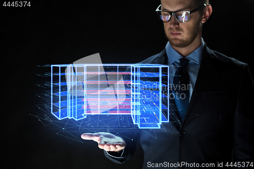 Image of close up of businessman with virtual projection