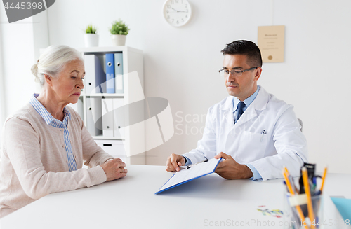 Image of senior woman and doctor meeting at hospital