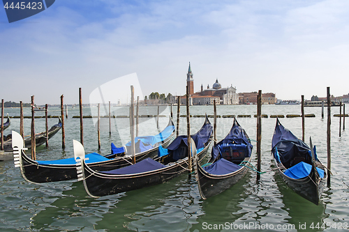 Image of A view of Venice lagoon and gondolas,  the Cathedral of San Gior