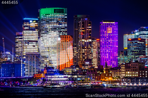 Image of Sydney\'s city buildings illuminated with colours during Vivid Sy