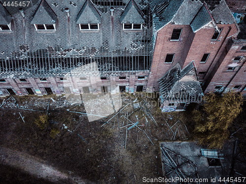 Image of Dilapidated neglected old building factory falling into ruin and disrepair