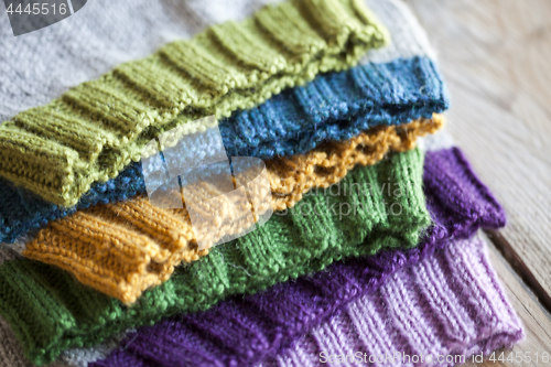 Image of Multicolor knitted hats stack.