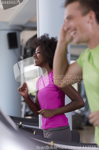 Image of people exercisinng a cardio on treadmill