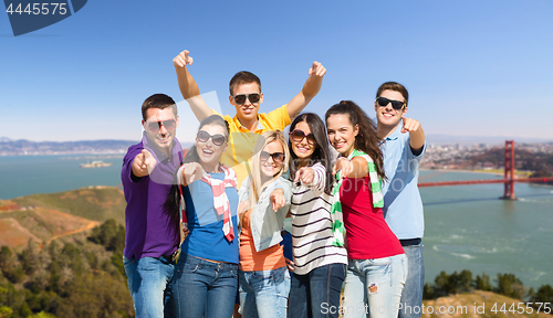 Image of group of happy friends over golden gate bridge