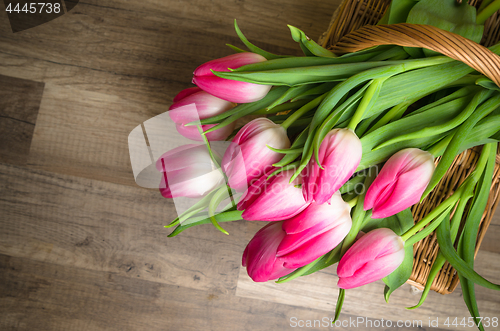 Image of Beautiful bouquet from pink tulips  on a table