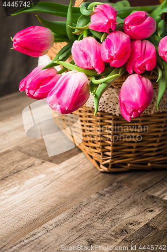 Image of Beautiful bouquet from pink tulips  on a table