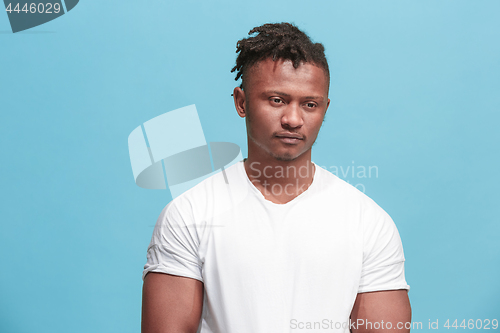 Image of Beautiful afro-american man looking suprised and bewildered isolated on pink