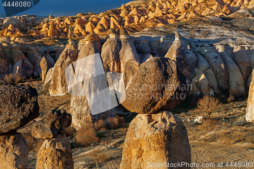 Image of Fairy houses stone cliffs