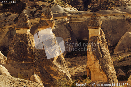 Image of Fairy houses stone cliffs