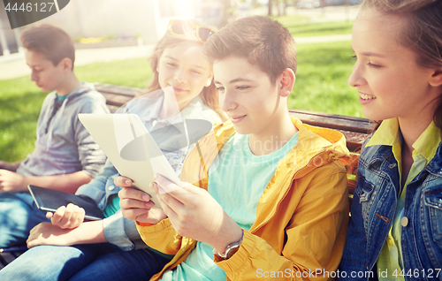 Image of group of students with tablet pc at school yard