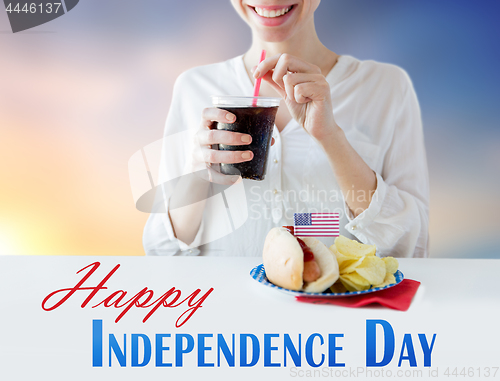 Image of happy woman celebrating american independence day