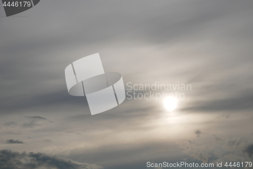 Image of Gray clouds and the sun