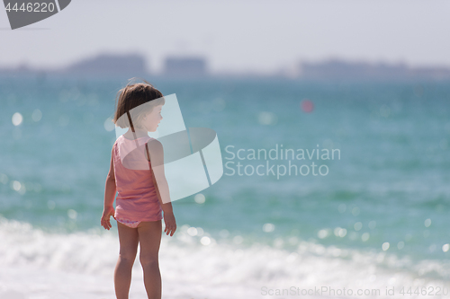 Image of little cute girl at beach