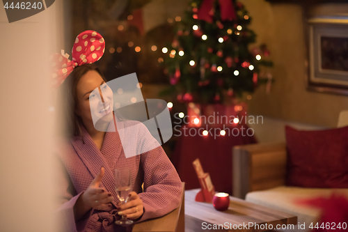 Image of woman drinking champagne at spa