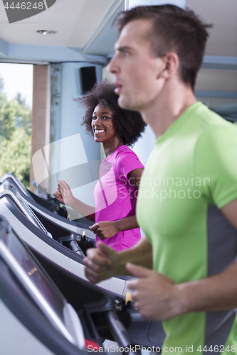 Image of people exercisinng a cardio on treadmill in gym