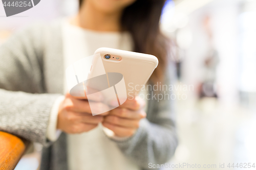 Image of Woman use of mobile phone