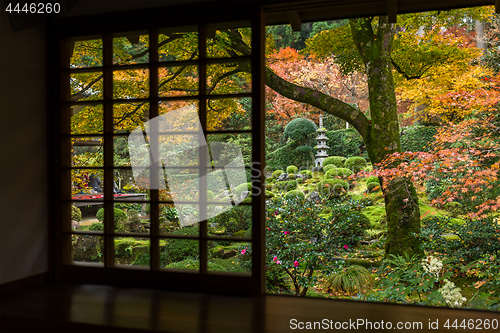 Image of Japanese house with autumn landscape