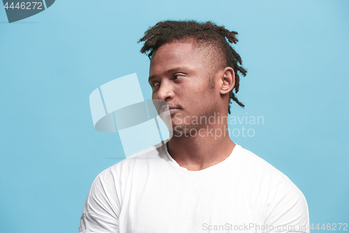 Image of Beautiful bored faro-american man bored isolated on blue background