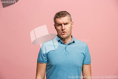 Image of Beautiful bored man bored isolated on pink background