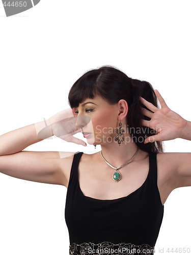 Image of Young woman profile portrait with hands