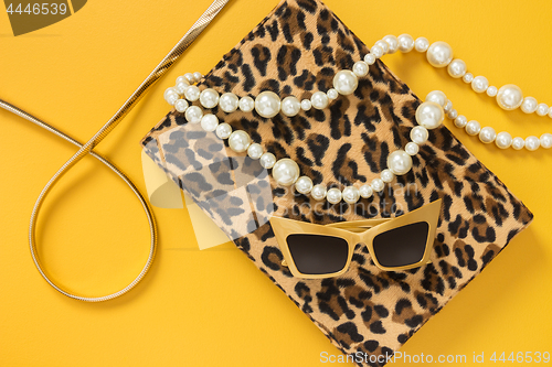 Image of Fashion accessories on yellow background