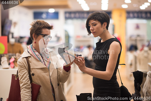 Image of best friend shopping in big mall